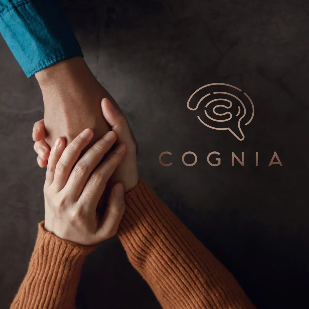 Two hands clasped together with Cognia Health logo