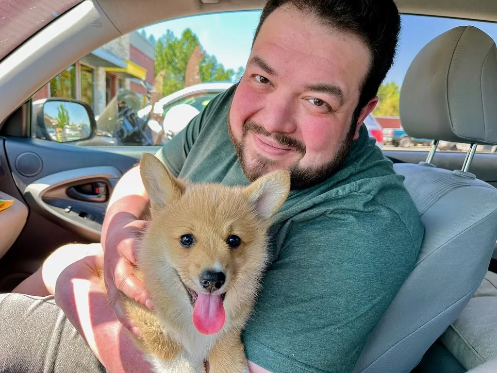 Matias with his corgi