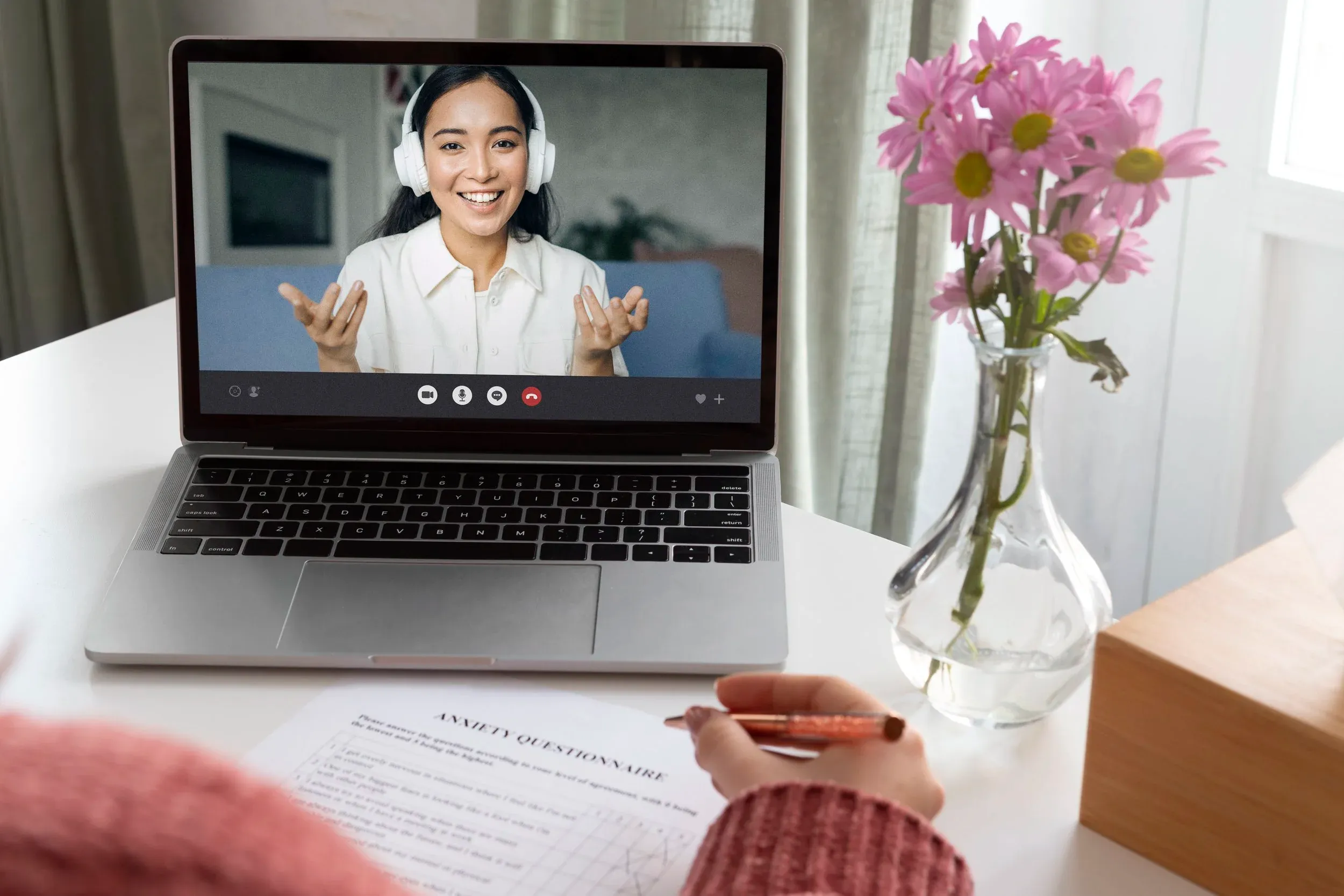A person attending an online therapy session from home